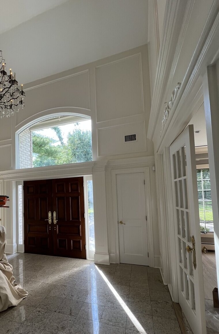 Foyer millwork and trim, hand-finished