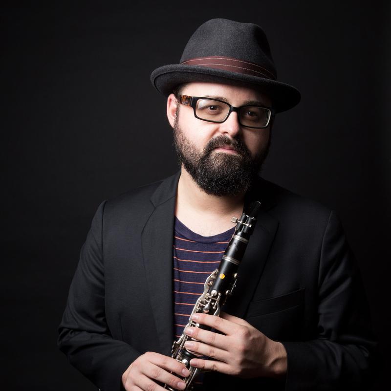 Michael Winograd holding a clarinet